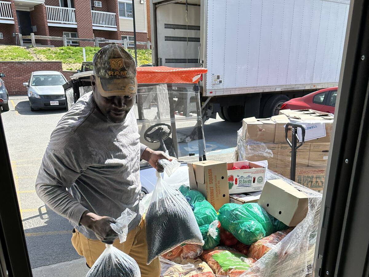 Unloading a pallet of fresh food